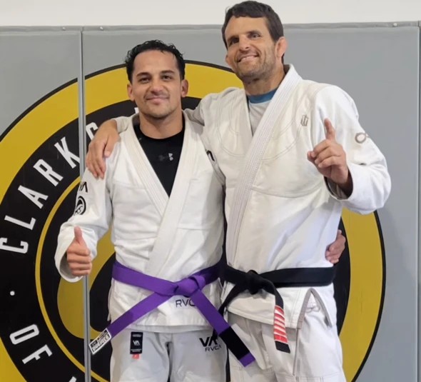 Luis Banda receiving his Brazilian Jiu-Jitsu purple belt
